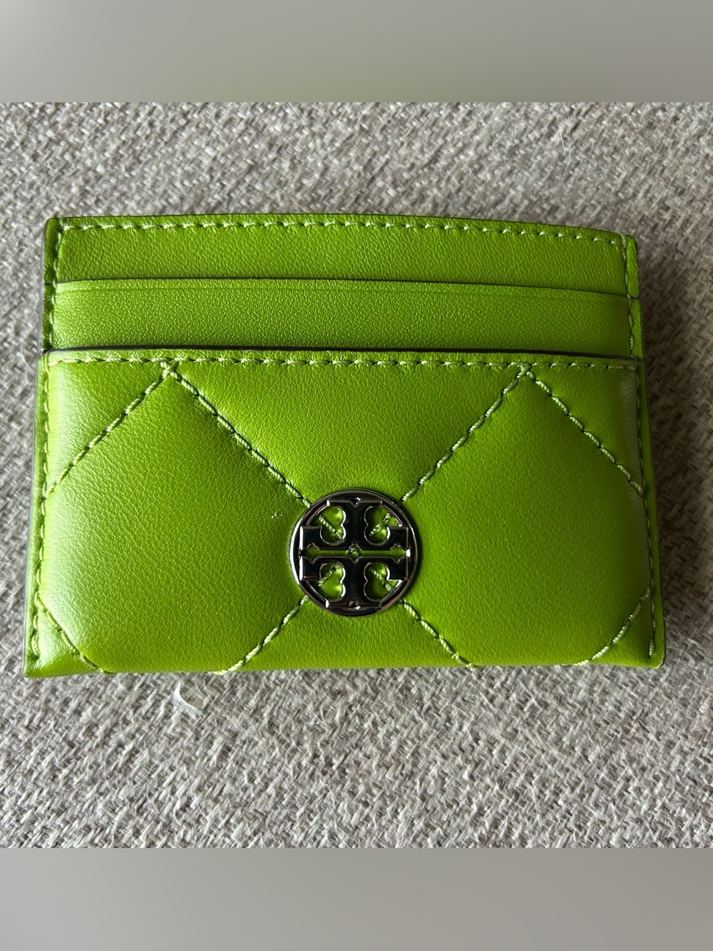Tory Burch Lime Green Quilted Card Holder with Logo Medallion.